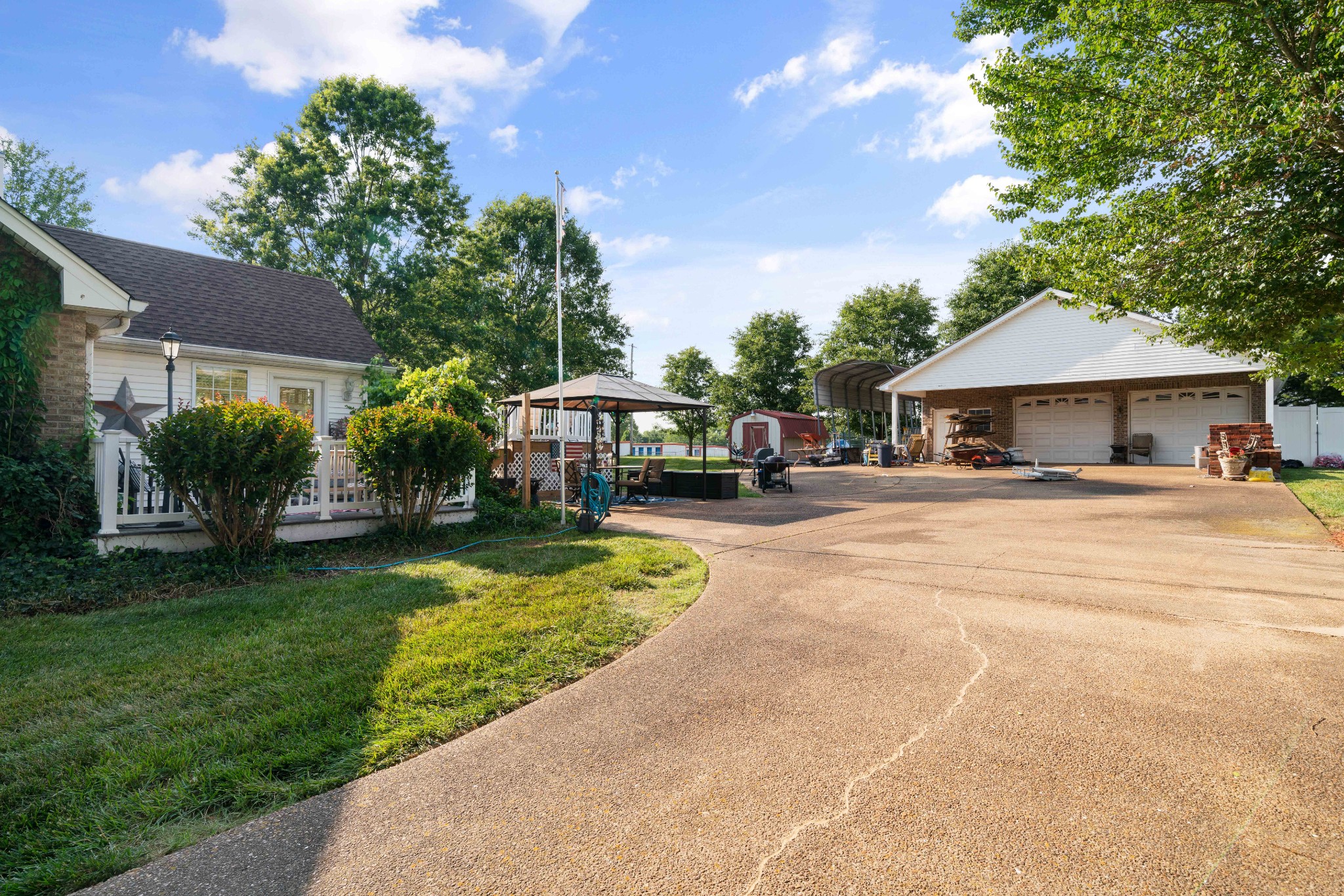 425 Fowler Ford Road Portland, TN 37148 - Photo 3 of 40 a front view of a house with a garden