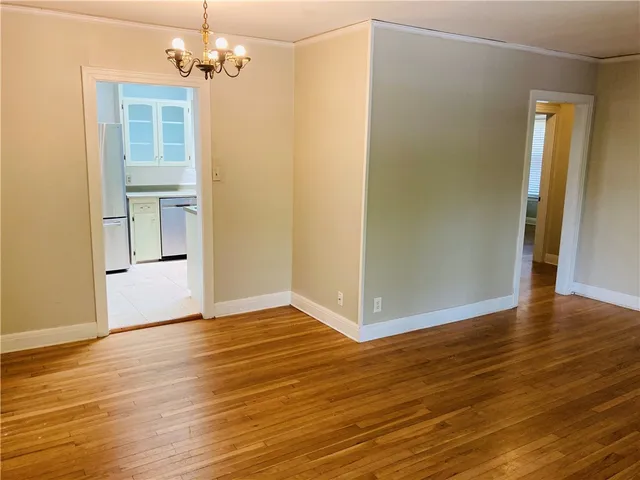 a view of an empty room and window