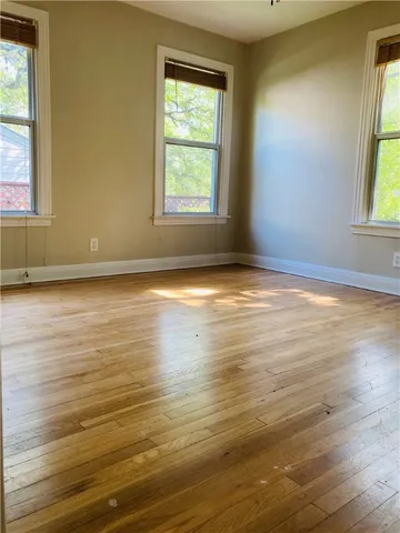 a house with trees in the background