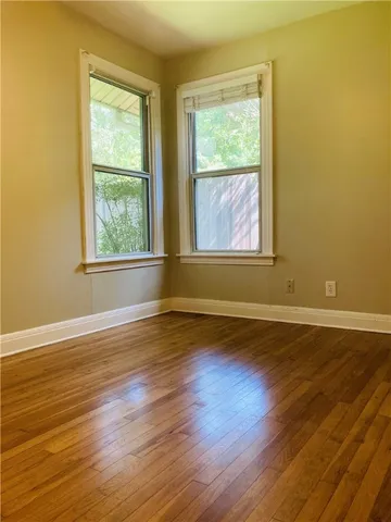 a kitchen with cabinets stainless steel appliances and a sink