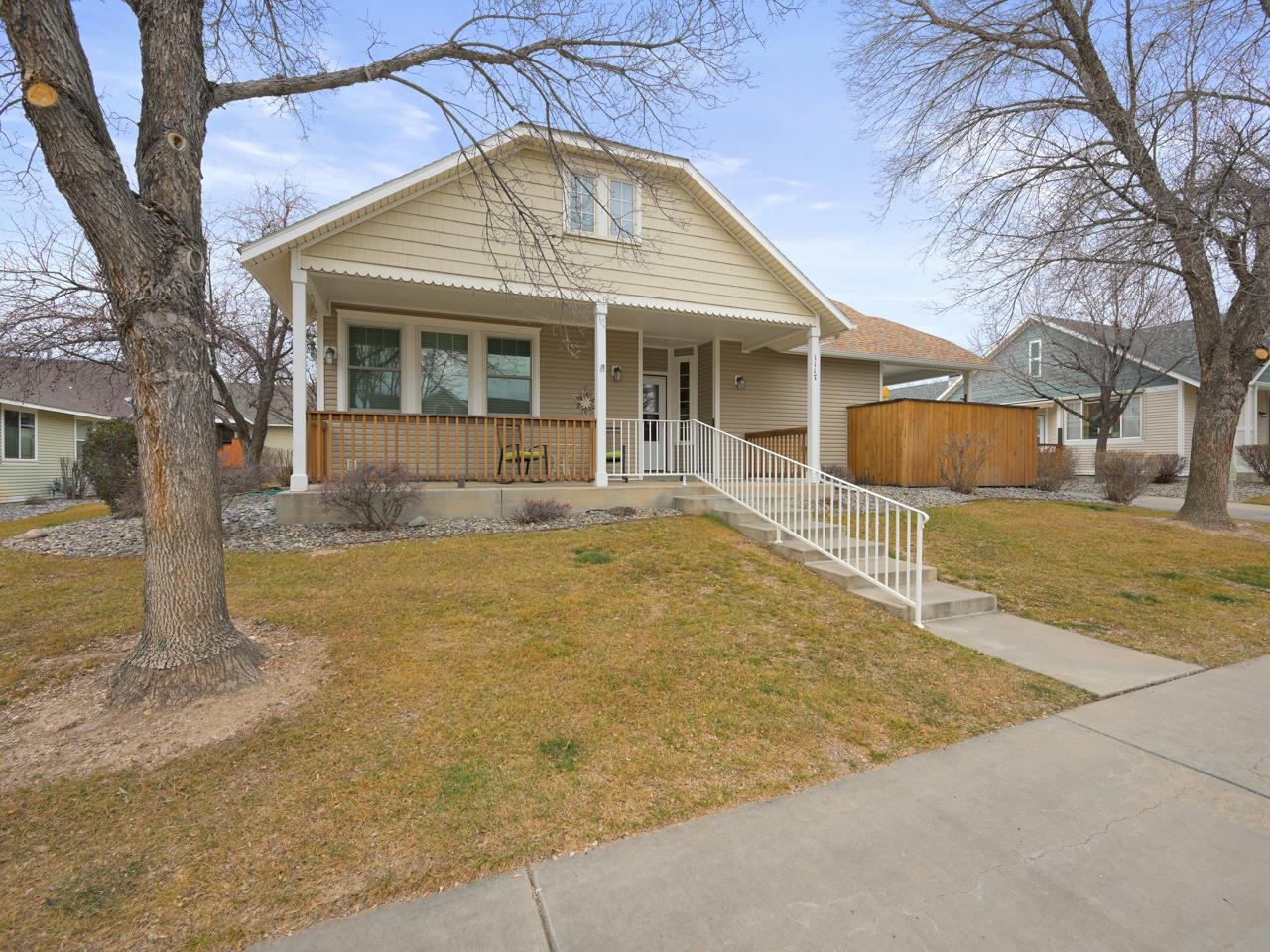 1117 Buttercup Lane Fruita, CO 81521 - Photo 2 of 25 front view of a house with a yard