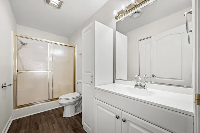 a bathroom with a sink and a large mirror