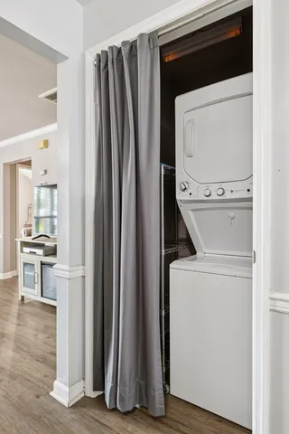 a view of kitchen and wooden floor