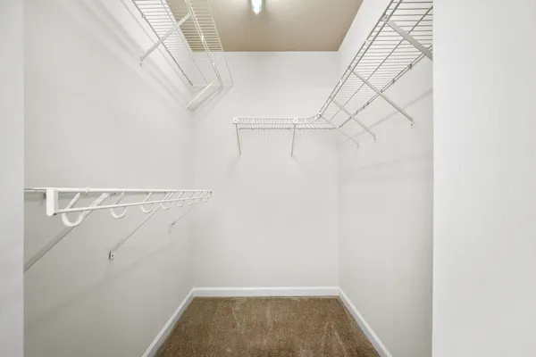 a view of a room with racks on the wall