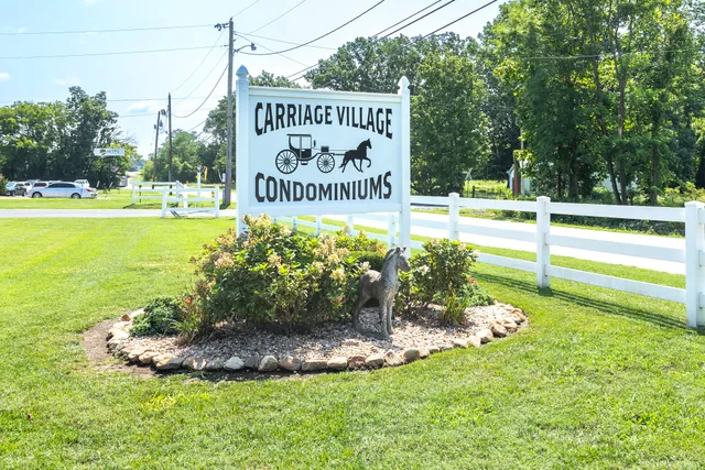 a view of a park with welcome board