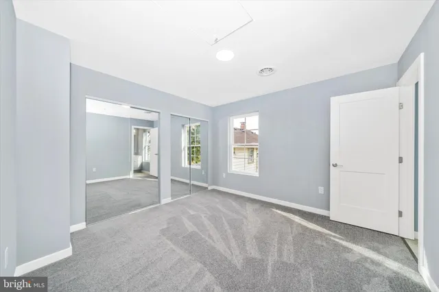 a view of an empty room with window