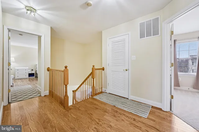 a view of a bedroom from a hallway