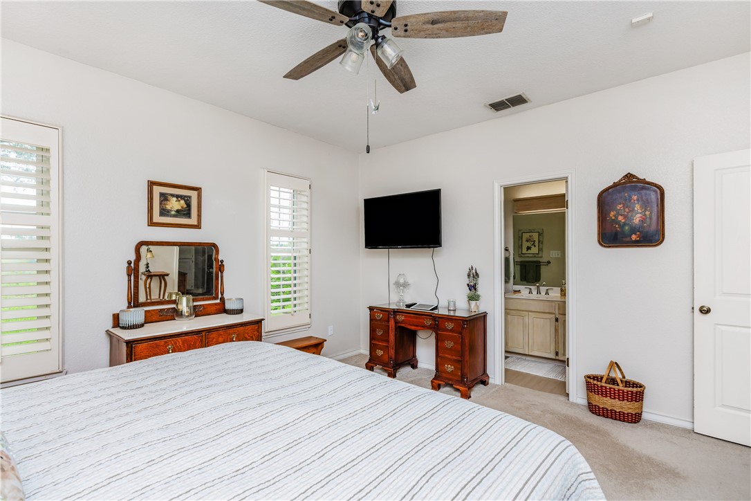 345 Trail Ridge Drive Sandia, TX 78383 - Photo 32 of 40 a bedroom with a bed and a flat screen tv