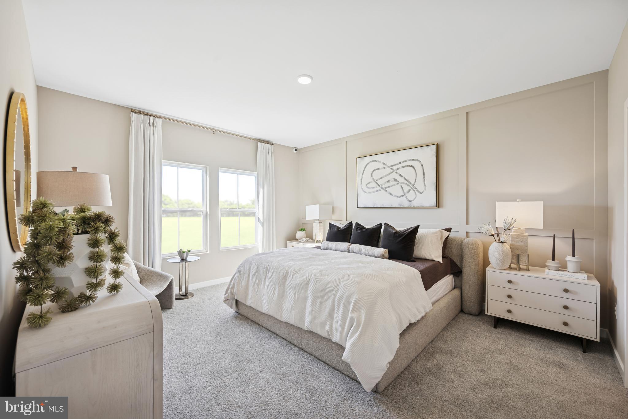 (lot 414-tbd Lot 414-tbd Street Ranson, WV 25438 - Photo 6 of 16 a spacious bedroom with a bed and a couch