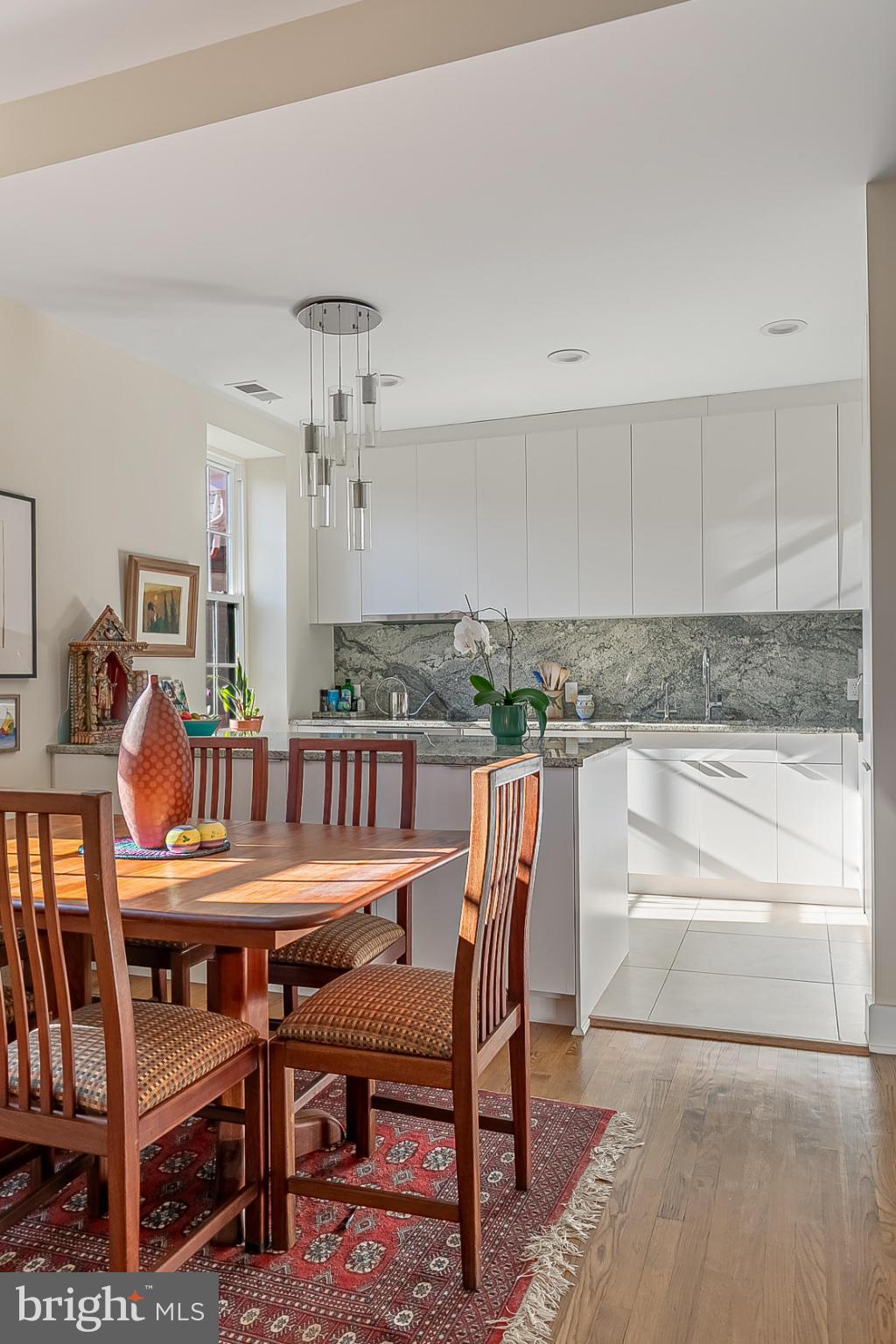 1517 30th Street Northwest, Unit C11 Washington, DC 20007 - Photo 13 of 33 a dining room with furniture and window