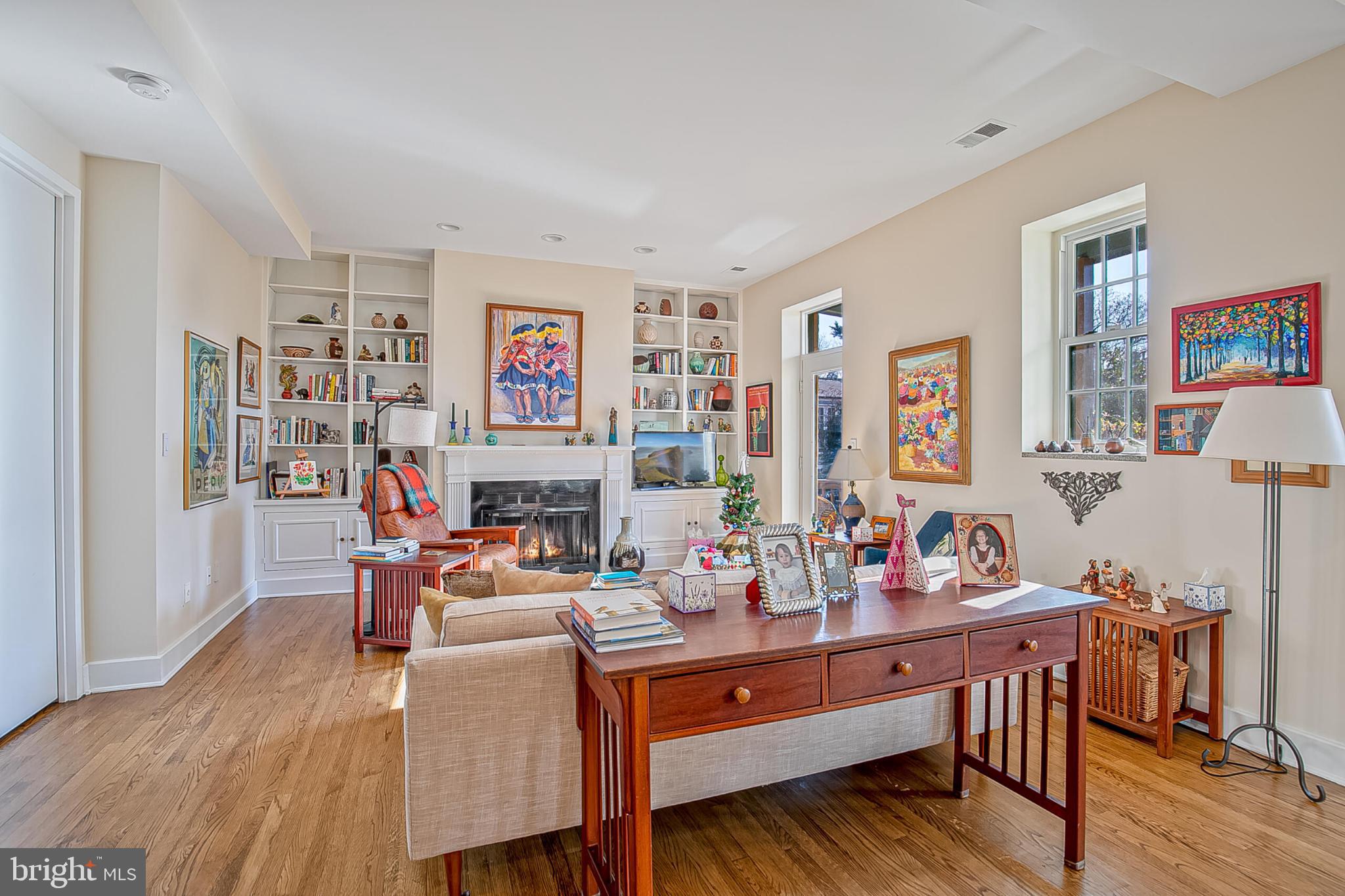 1517 30th Street Northwest, Unit C11 Washington, DC 20007 - Photo 2 of 33 a room with furniture and wooden floor