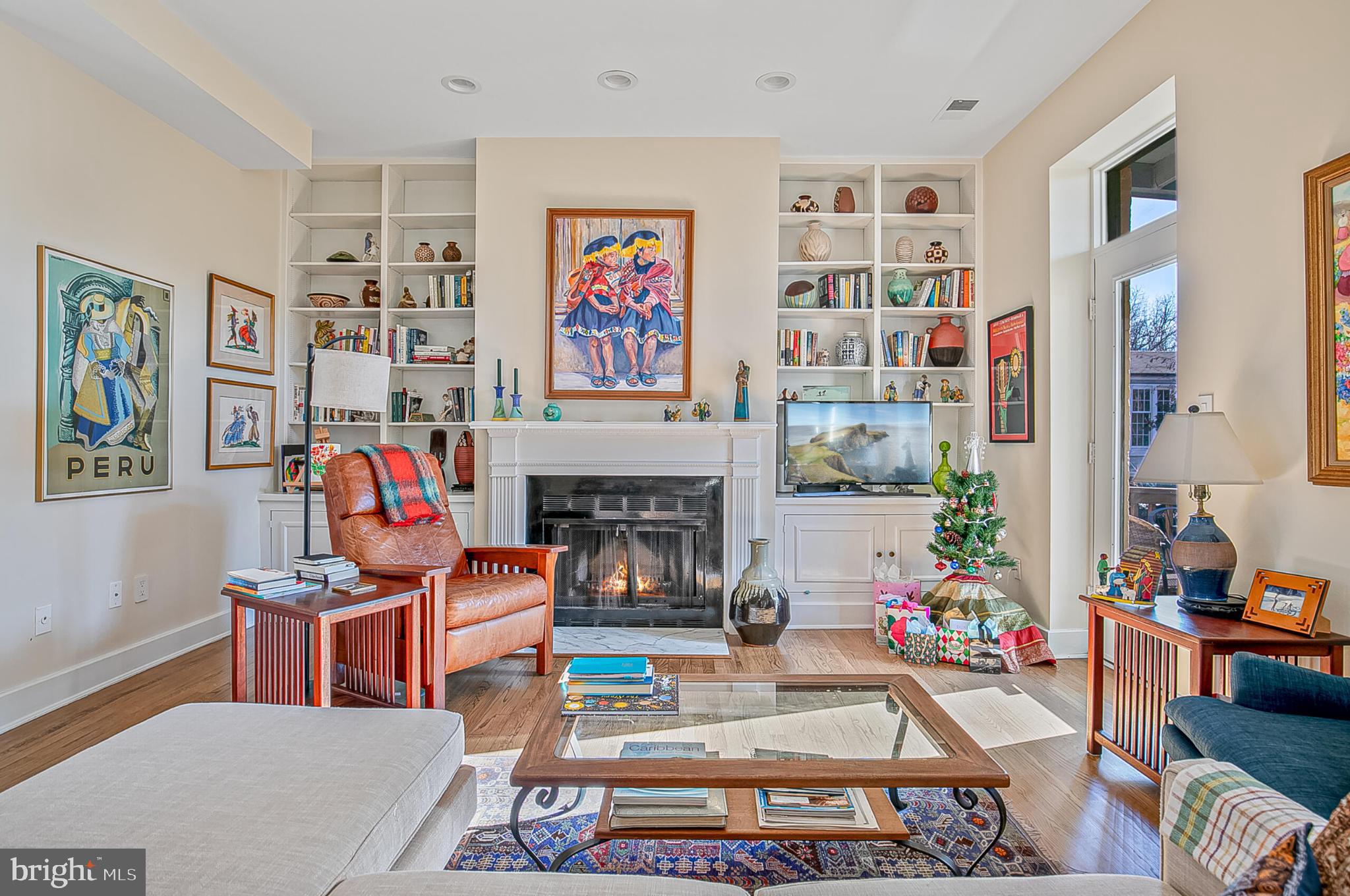 1517 30th Street Northwest, Unit C11 Washington, DC 20007 - Photo 3 of 33 a living room with fireplace furniture and decor