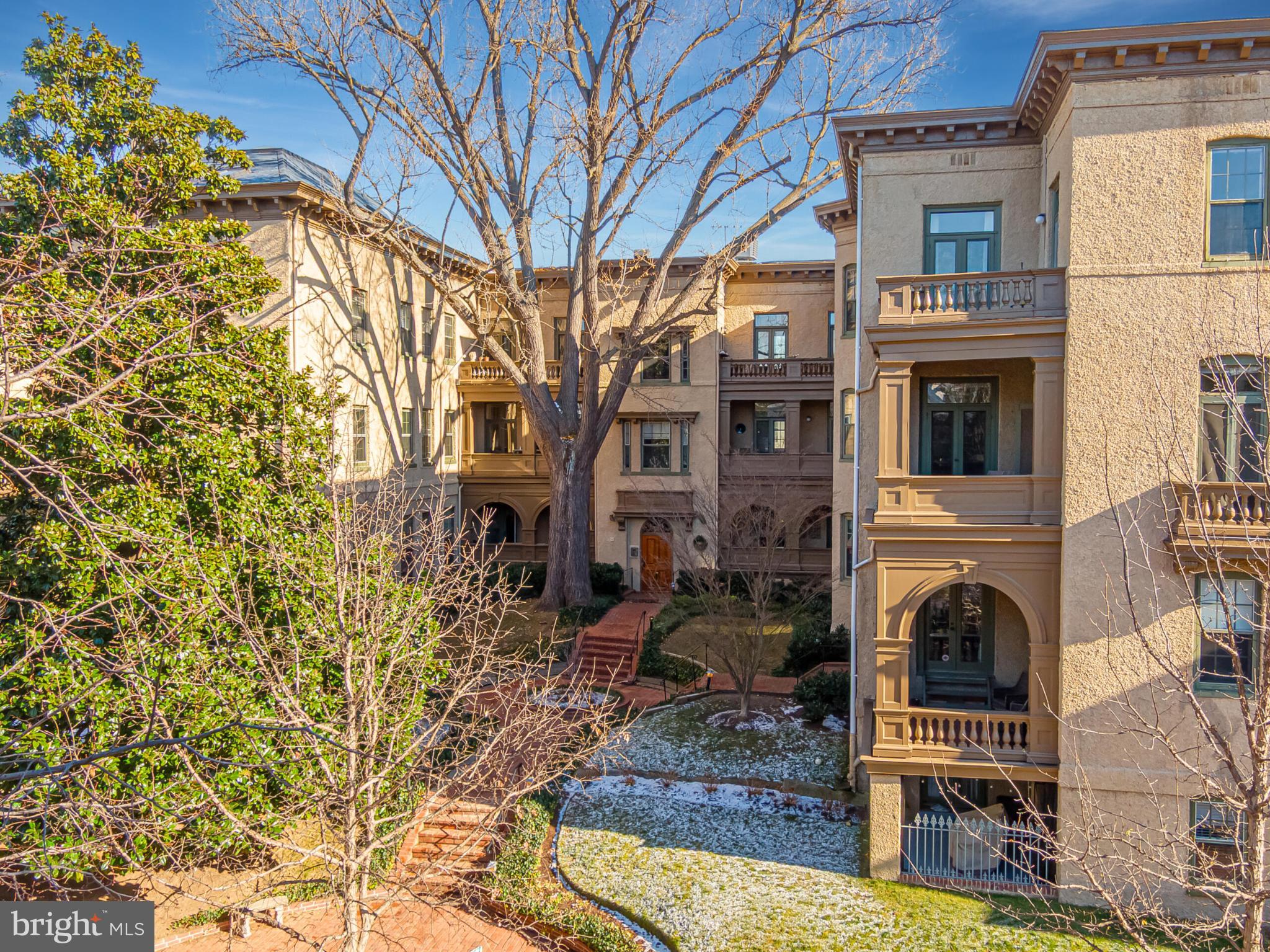 1517 30th Street Northwest, Unit C11 Washington, DC 20007 - Photo 31 of 33 a view of a house with a sink and large tree