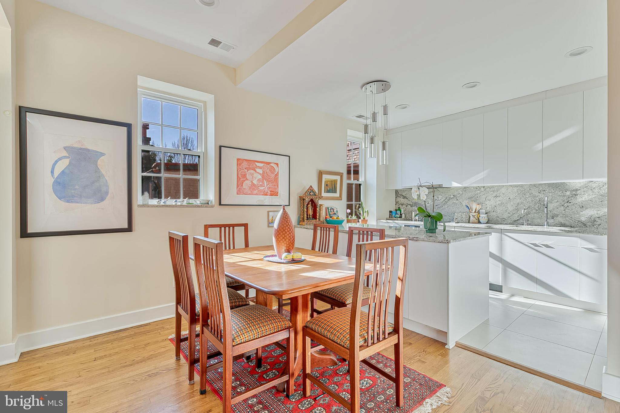 1517 30th Street Northwest, Unit C11 Washington, DC 20007 - Photo 8 of 33 a dining room with furniture and window