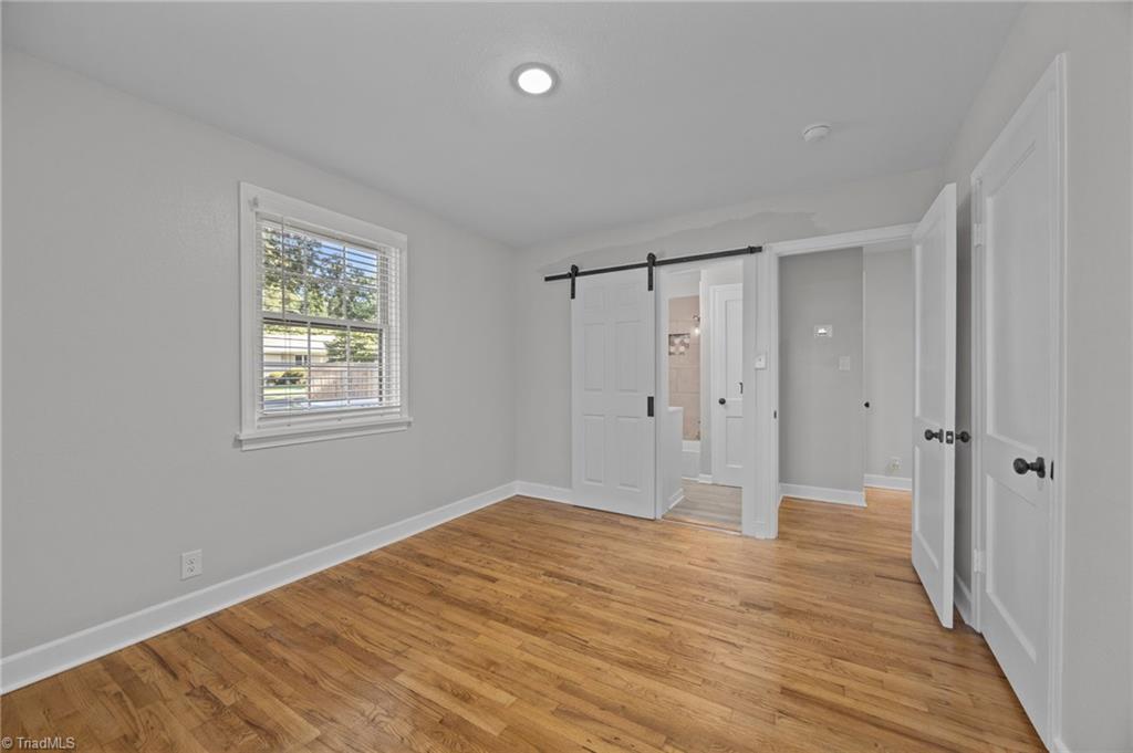 940 North Peace Haven Road Winston-Salem, NC 27104 - Photo 15 of 26 Primary Bedroom with ensuite bathroom
