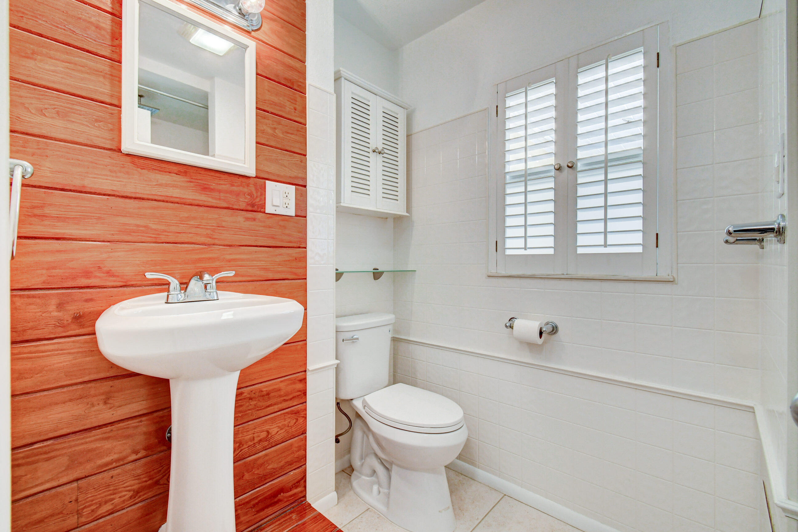 4 Gibbs Road, Unit 1 Boynton Beach, FL 33435 - Photo 17 of 43 a bathroom with a sink a toilet and shower