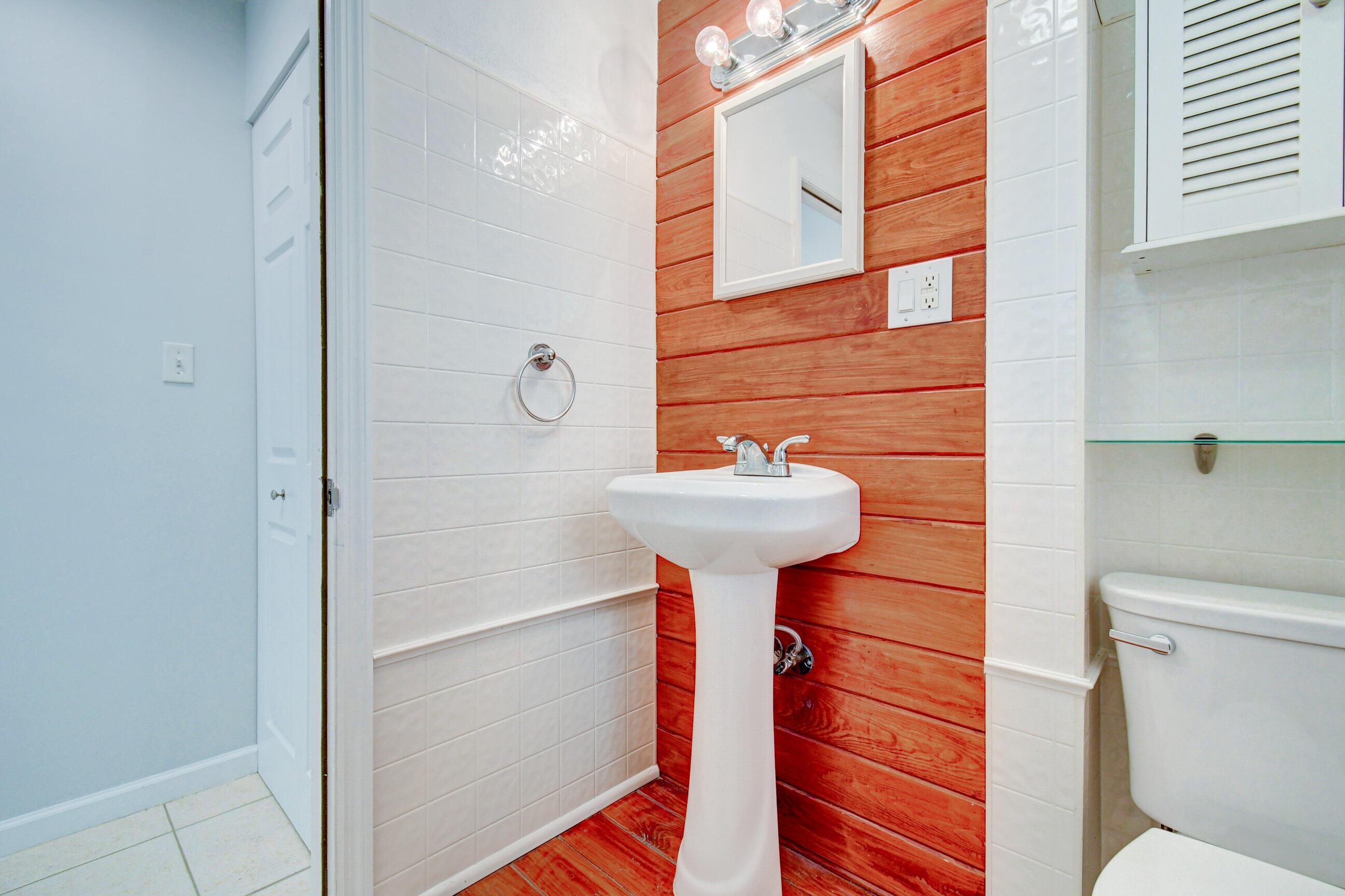 4 Gibbs Road, Unit 1 Boynton Beach, FL 33435 - Photo 18 of 43 a bathroom with a sink and a toilet