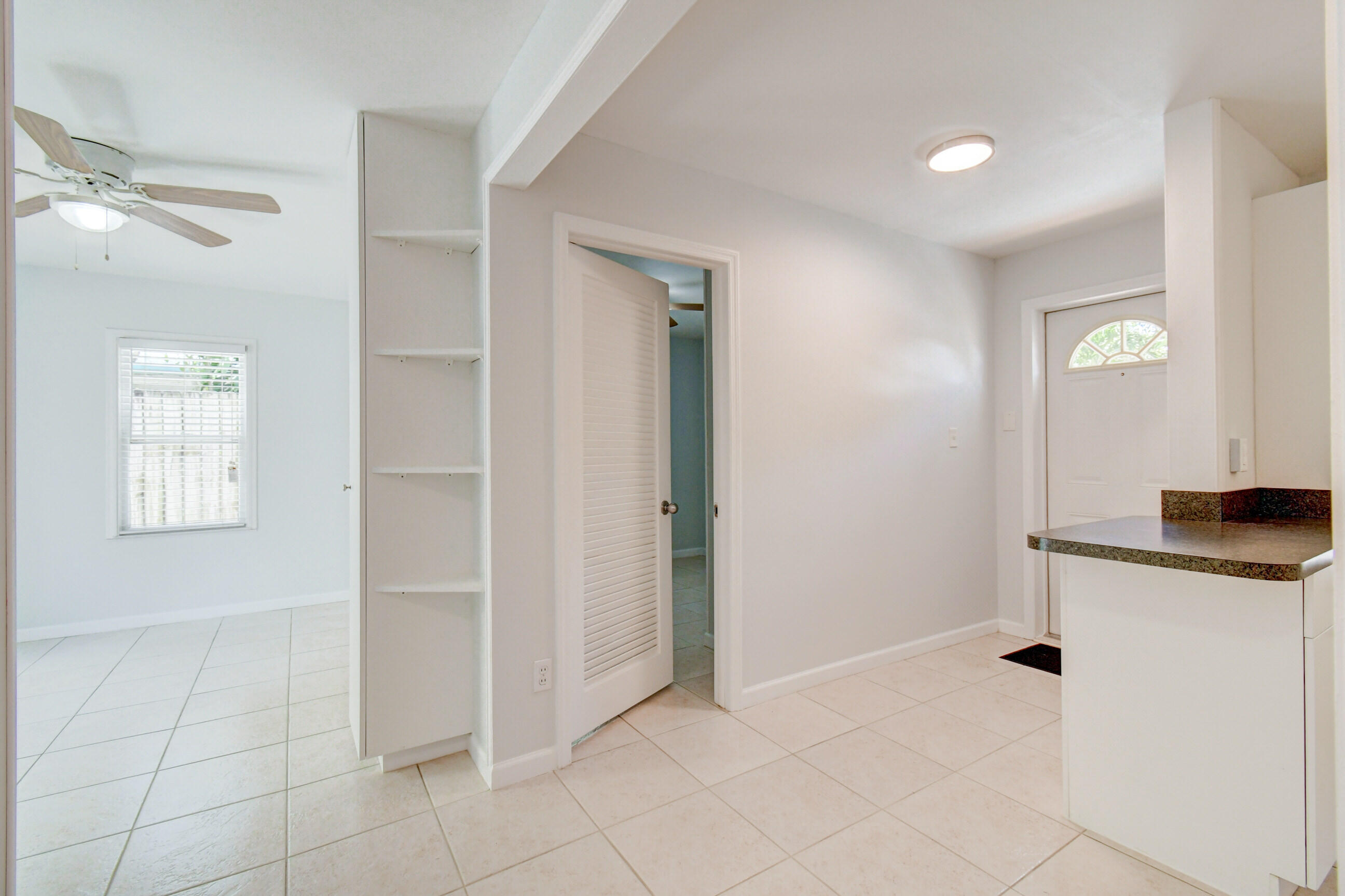 4 Gibbs Road, Unit 1 Boynton Beach, FL 33435 - Photo 21 of 43 a view of a kitchen with a sink