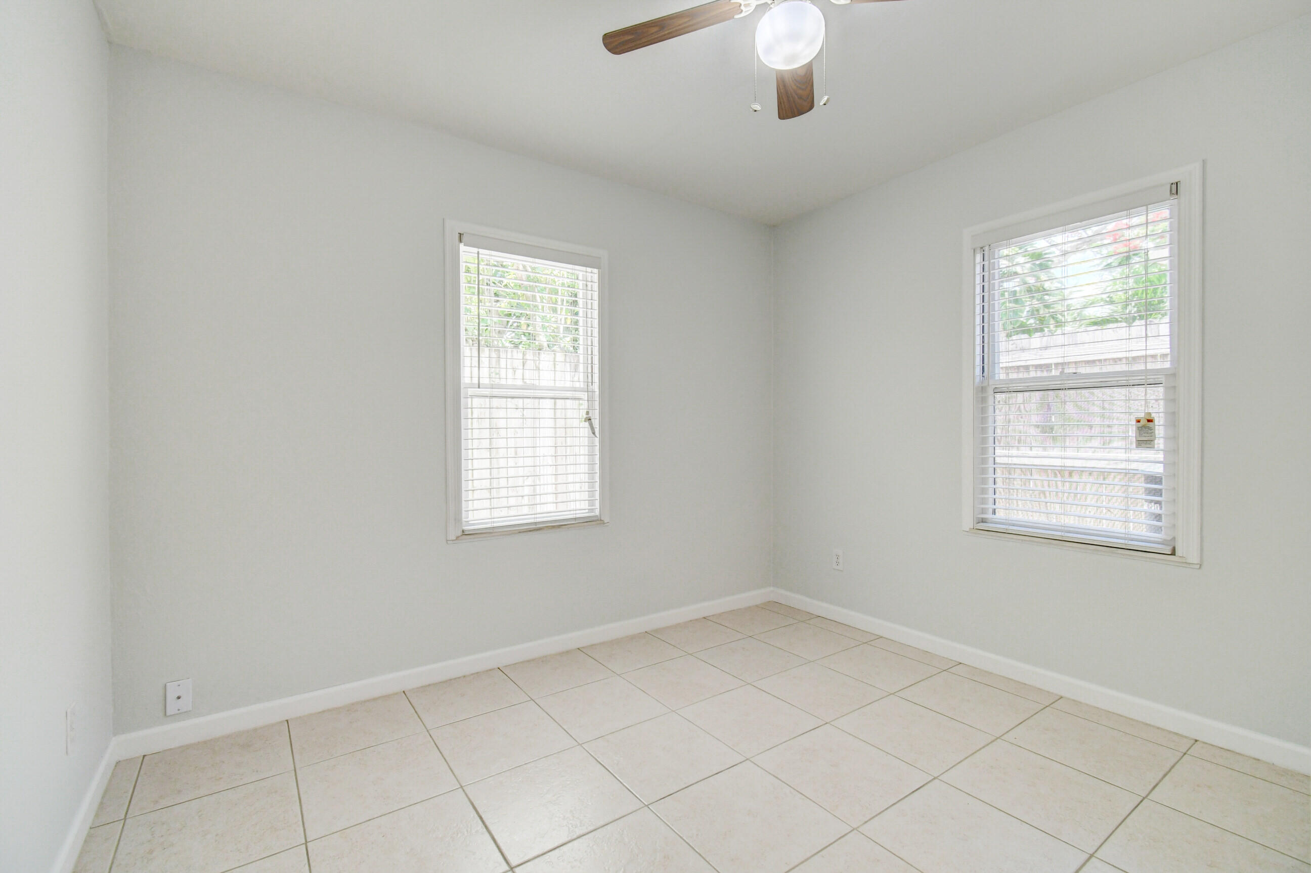 4 Gibbs Road, Unit 1 Boynton Beach, FL 33435 - Photo 24 of 43 an empty room with windows