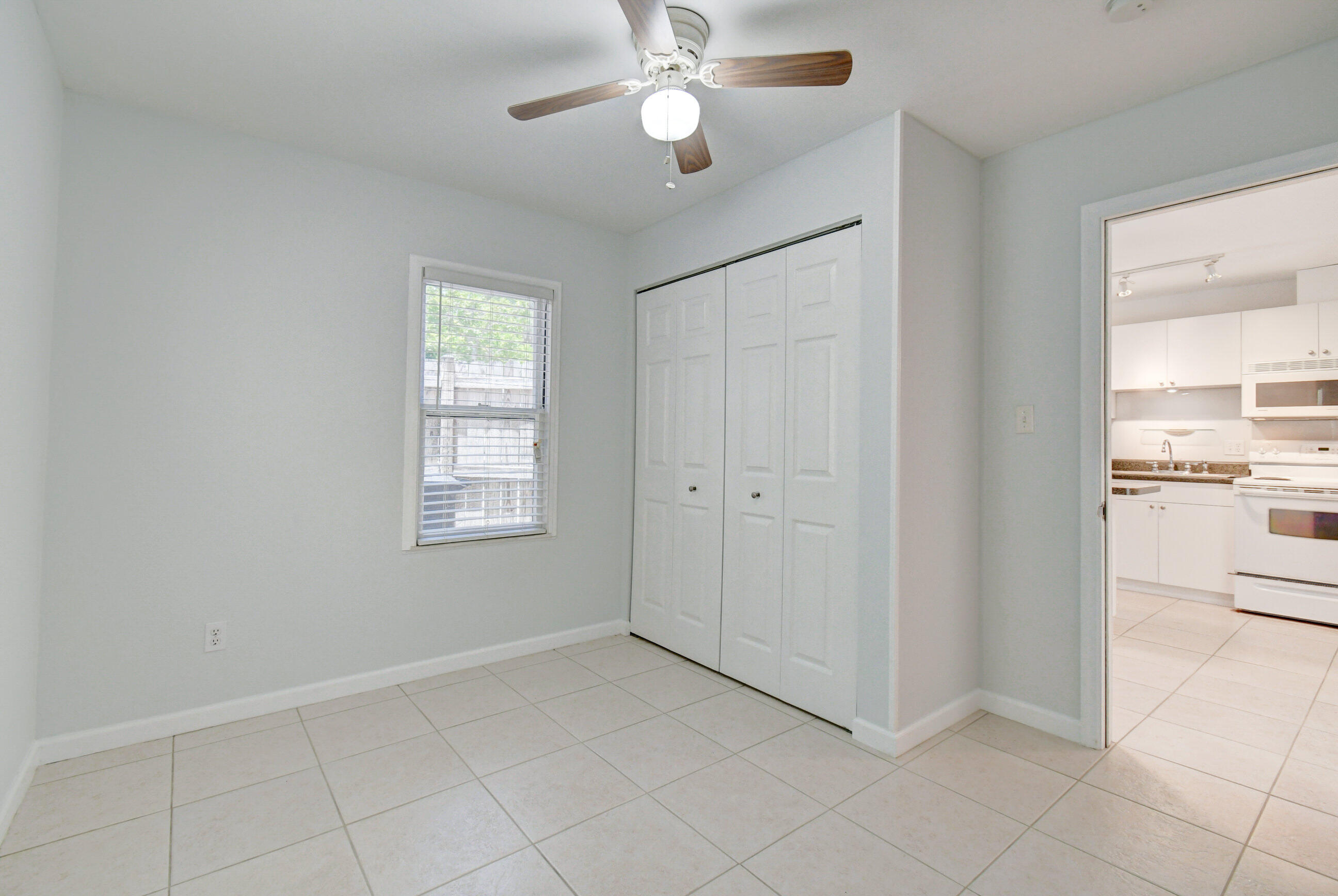 4 Gibbs Road, Unit 1 Boynton Beach, FL 33435 - Photo 25 of 43 a view of an empty room with a window