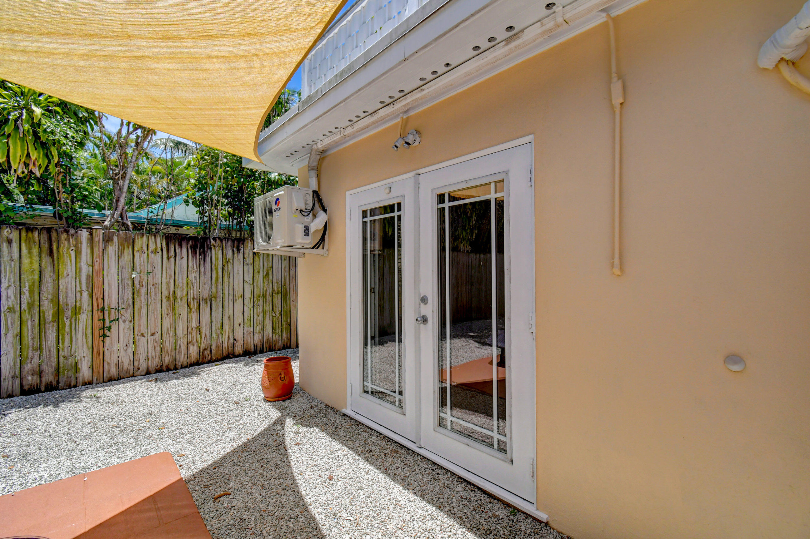4 Gibbs Road, Unit 1 Boynton Beach, FL 33435 - Photo 31 of 43 a backyard of a house with seating space