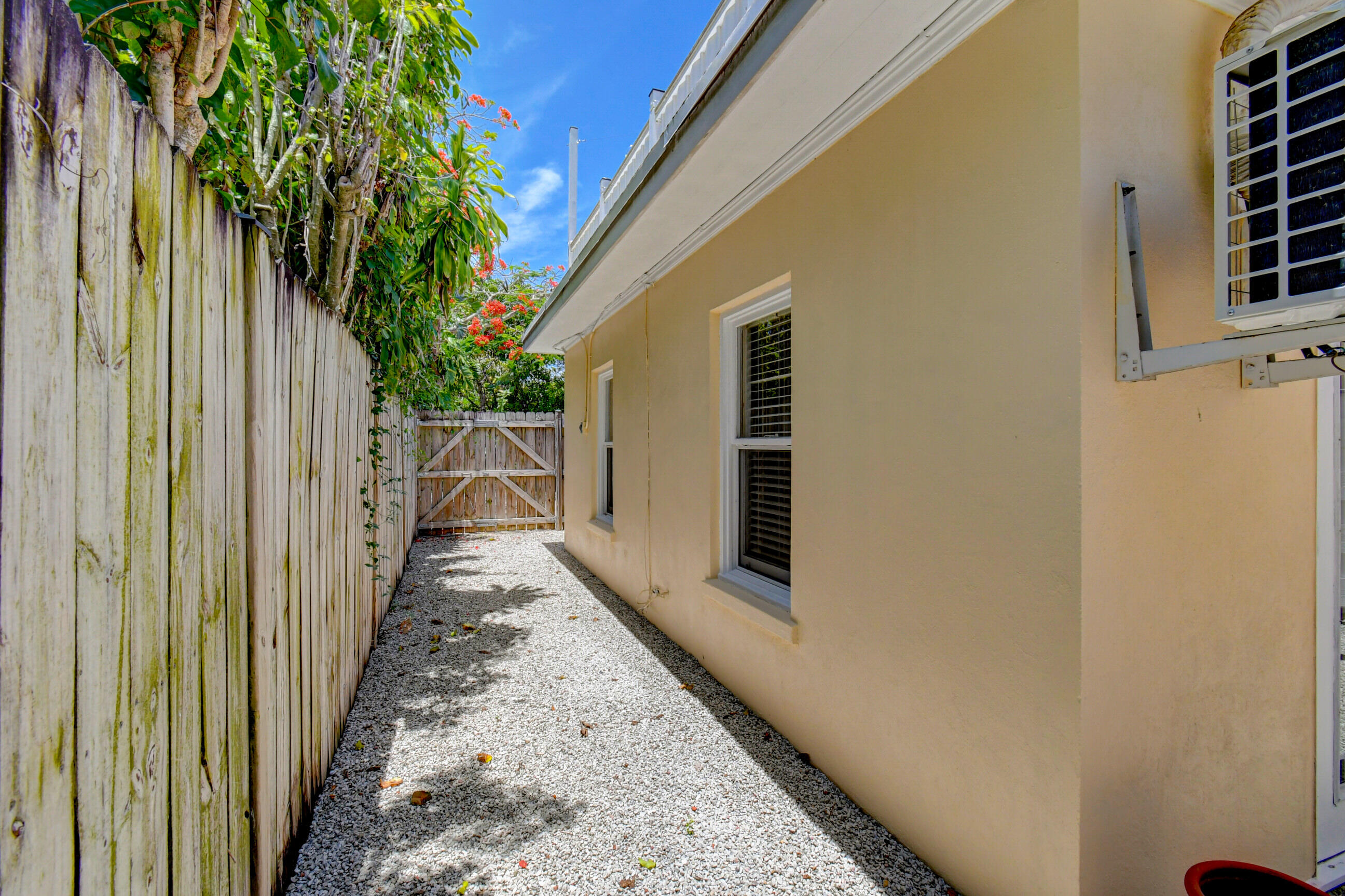4 Gibbs Road, Unit 1 Boynton Beach, FL 33435 - Photo 32 of 43 a view of a backyard with plants