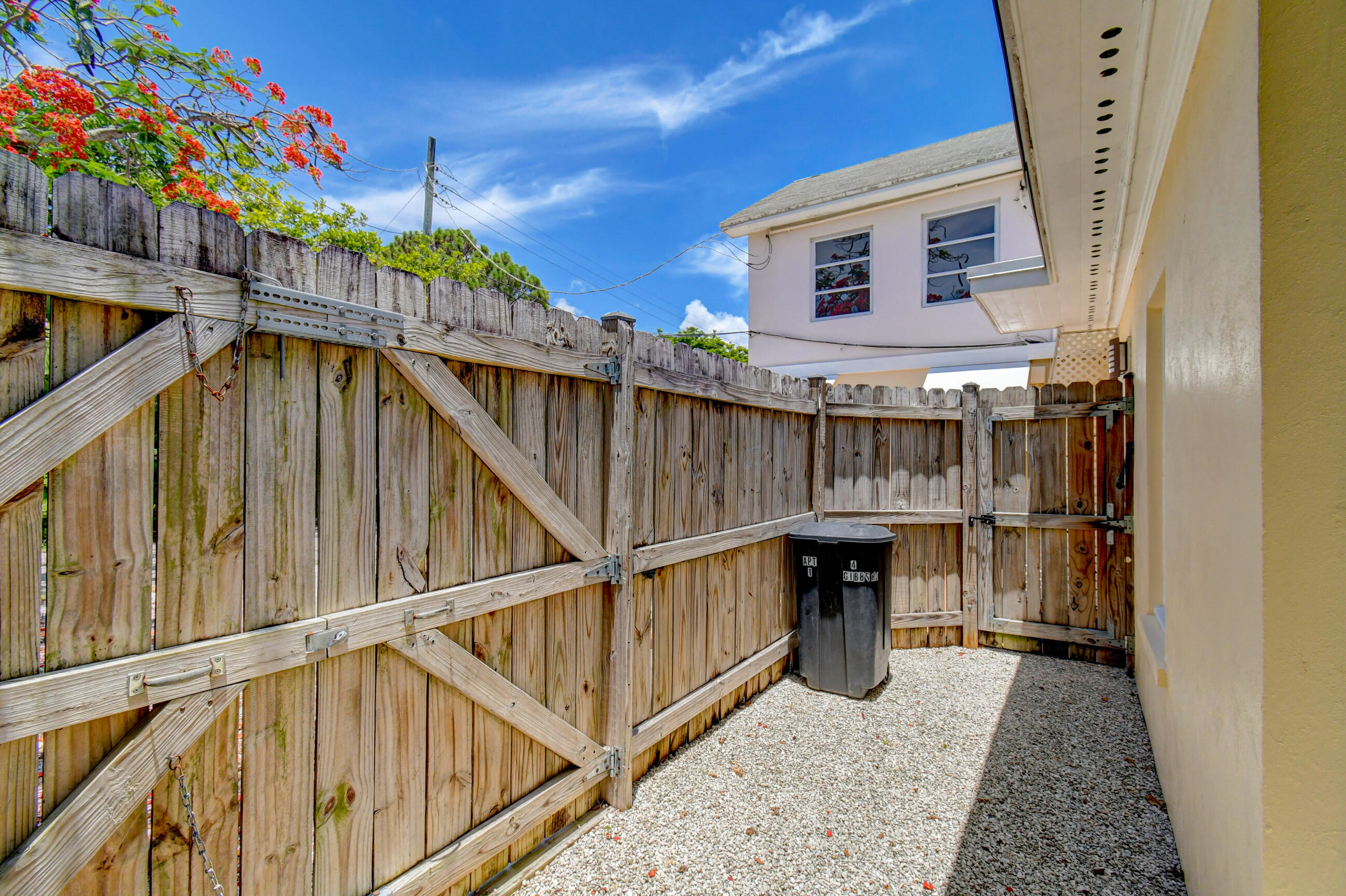 4 Gibbs Road, Unit 1 Boynton Beach, FL 33435 - Photo 34 of 43 a view of balcony with wooden floor and outdoor seating