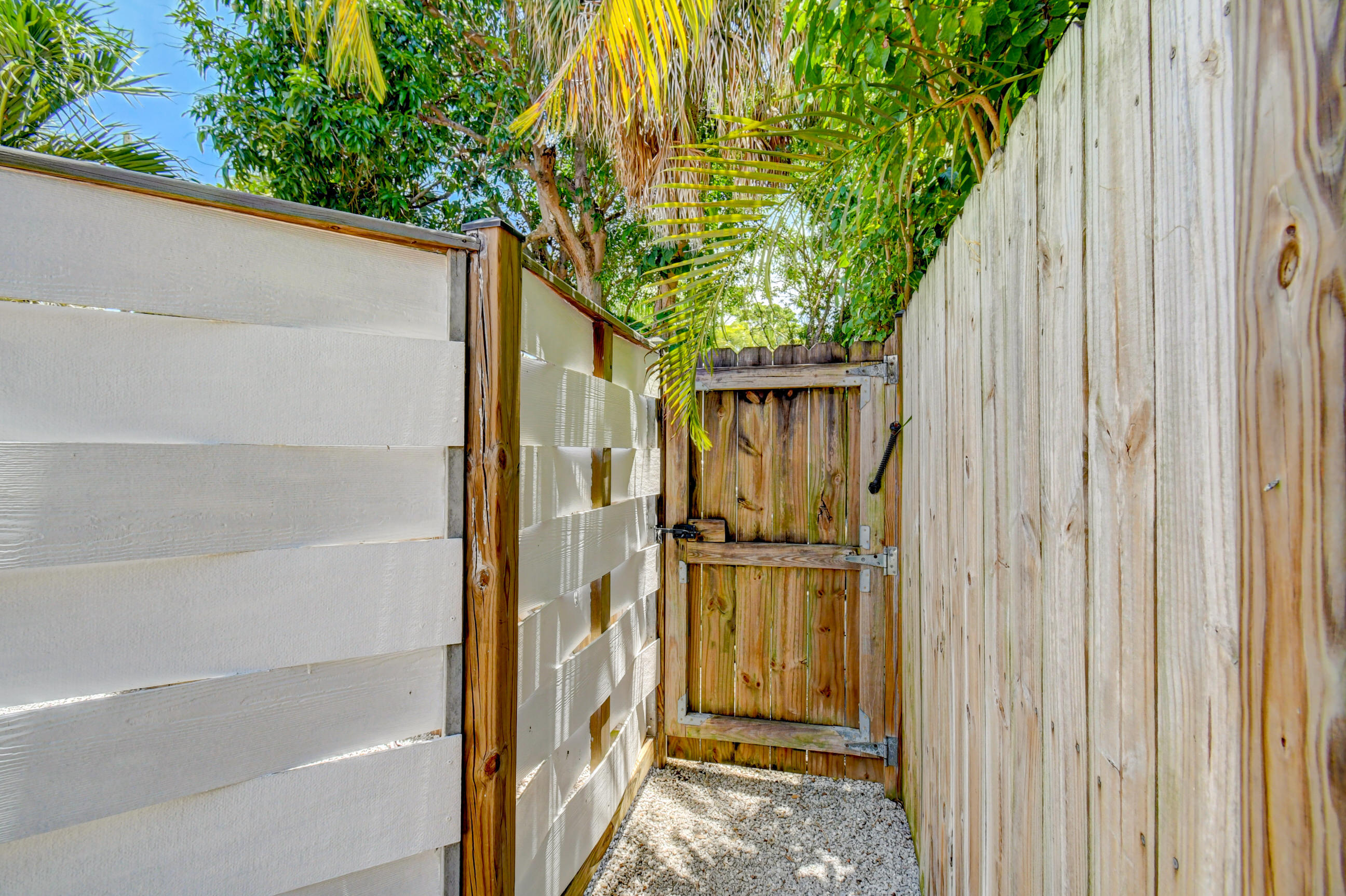 4 Gibbs Road, Unit 1 Boynton Beach, FL 33435 - Photo 37 of 43 a bathroom with a shower and a tub