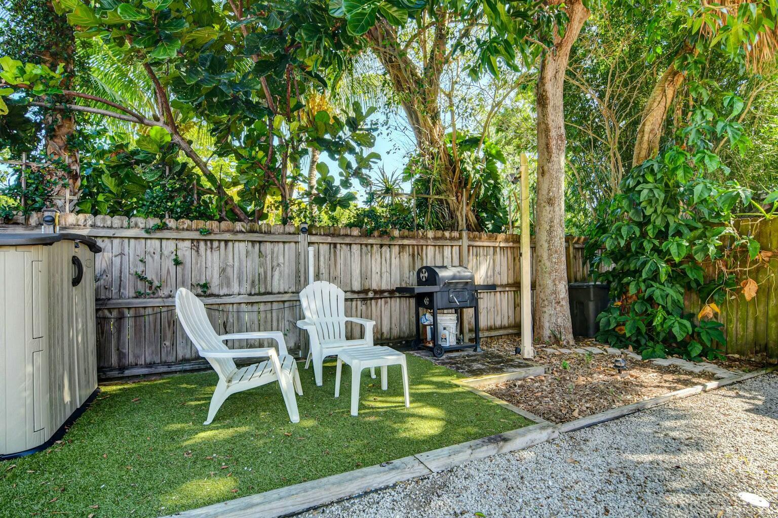 4 Gibbs Road, Unit 1 Boynton Beach, FL 33435 - Photo 39 of 43 a garden view with a seating space