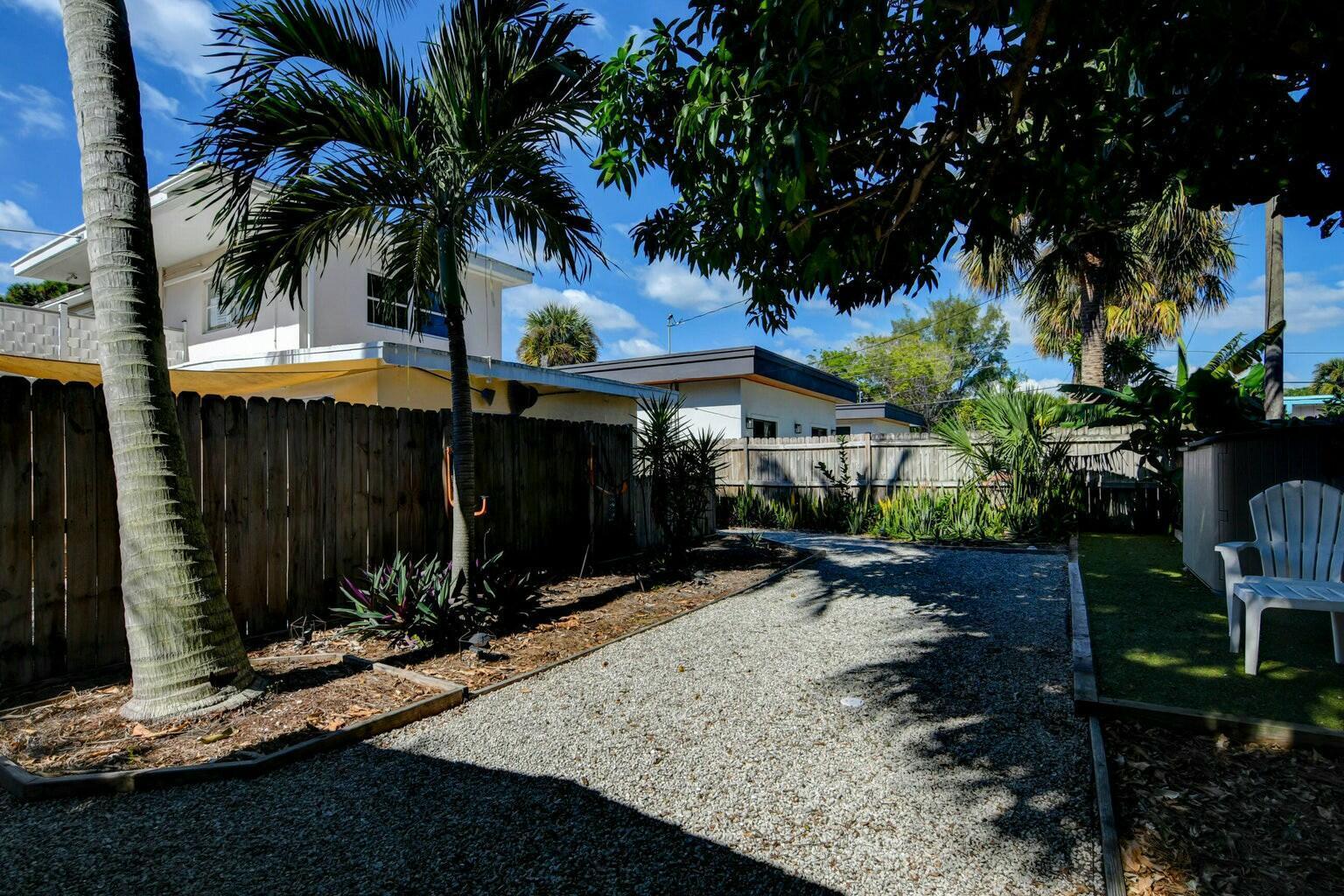 4 Gibbs Road, Unit 1 Boynton Beach, FL 33435 - Photo 41 of 43 a view of a backyard