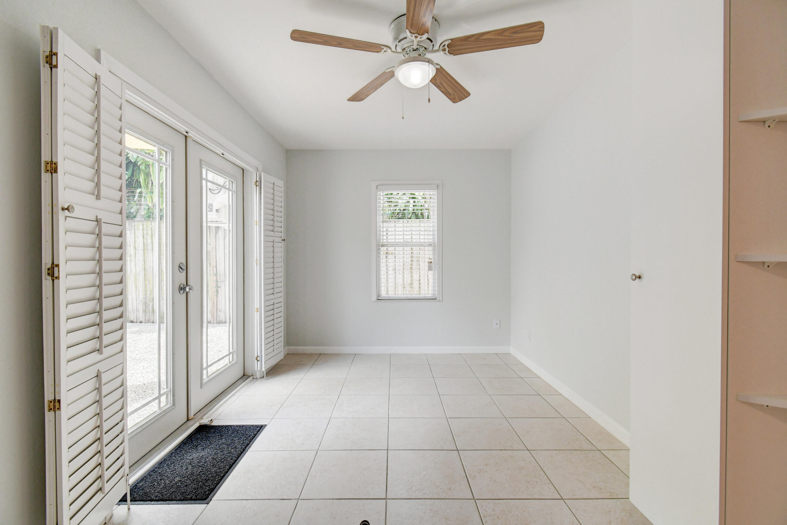 4 Gibbs Road, Unit 1 Boynton Beach, FL 33435 - Photo 8 of 43 a view of an empty room with a window