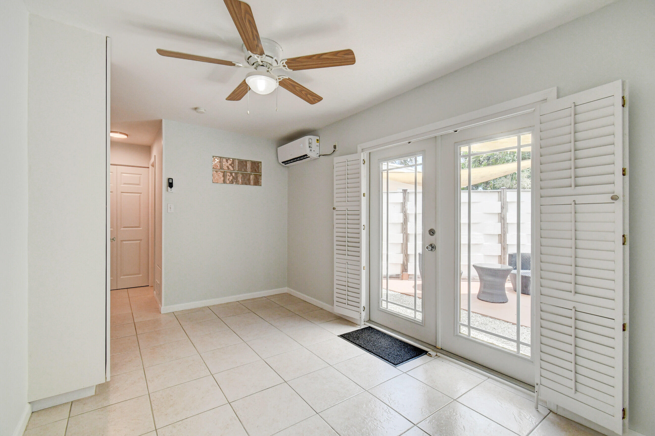 4 Gibbs Road, Unit 1 Boynton Beach, FL 33435 - Photo 10 of 43 a view of an empty room with a window