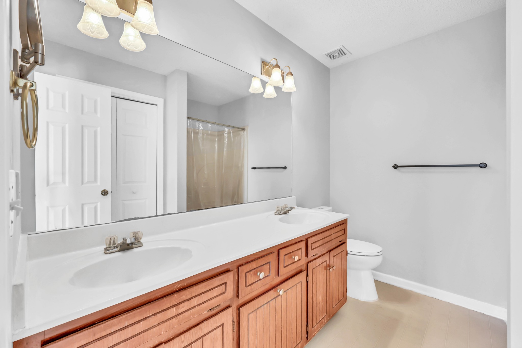 3708 Trenton Road Clarksville, TN 37042 - Photo 21 of 35 a bathroom with a sink a light fixture and a mirror
