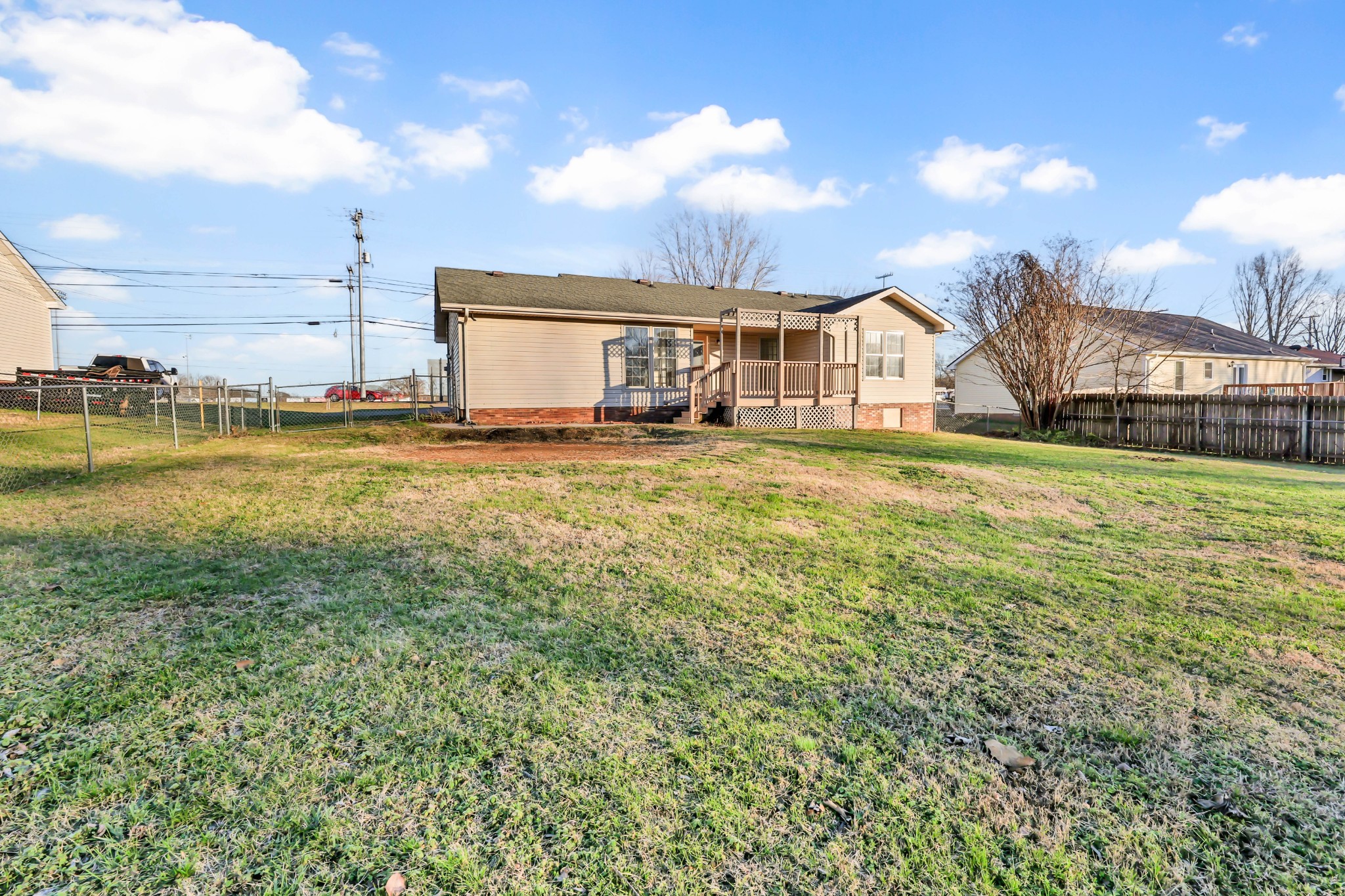 3708 Trenton Road Clarksville, TN 37042 - Photo 34 of 35 a view of a big house with a big yard and large trees