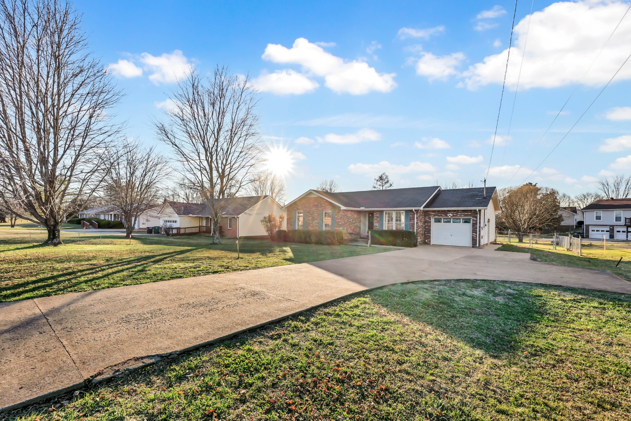 3708 Trenton Road Clarksville, TN 37042 - Photo 5 of 35 a front view of a house with a yard and large trees