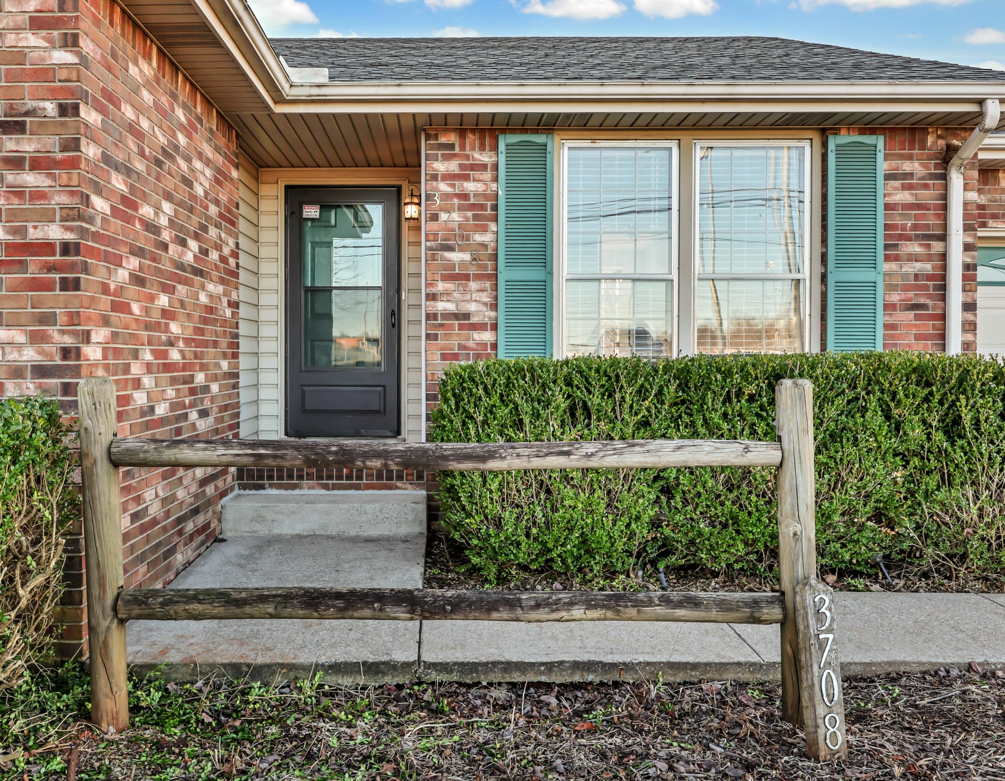 3708 Trenton Road Clarksville, TN 37042 - Photo 7 of 35 a front view of a house with a yard