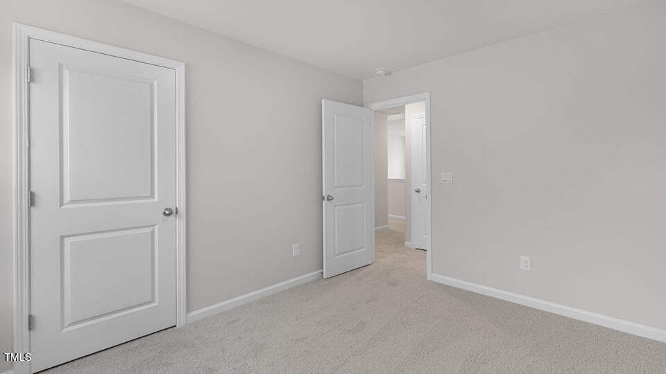 73 Stone Apiary Drive Angier, NC 27501 - Photo 17 of 32 a view of an empty room