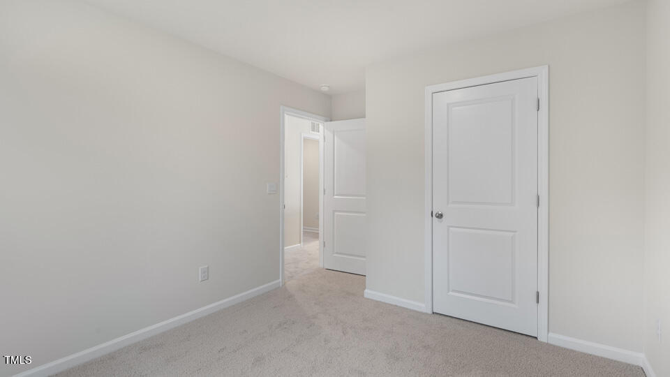 73 Stone Apiary Drive Angier, NC 27501 - Photo 19 of 32 a view of an empty room
