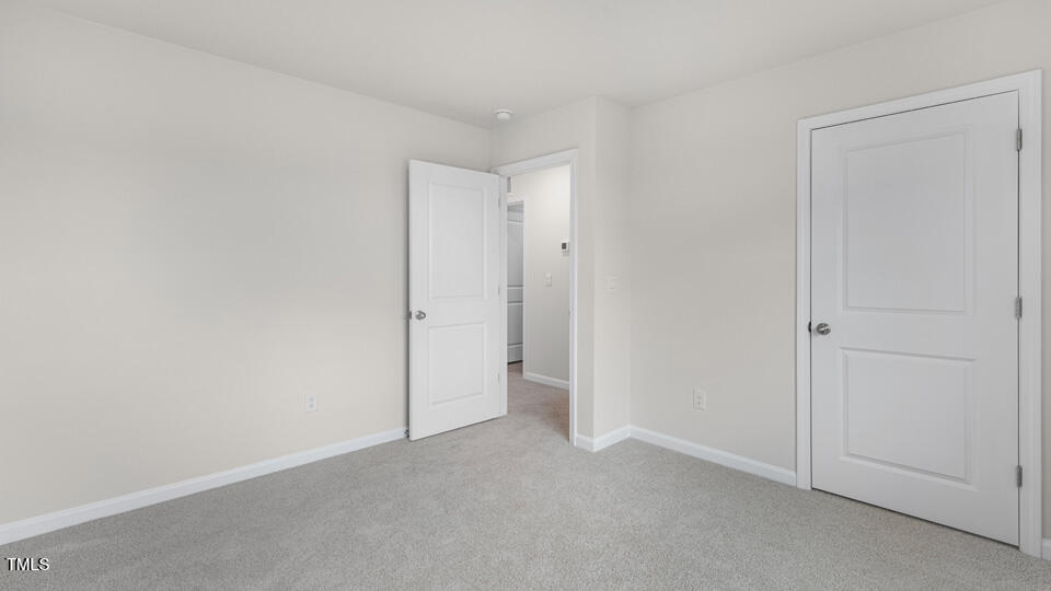 73 Stone Apiary Drive Angier, NC 27501 - Photo 21 of 32 a view of an empty room