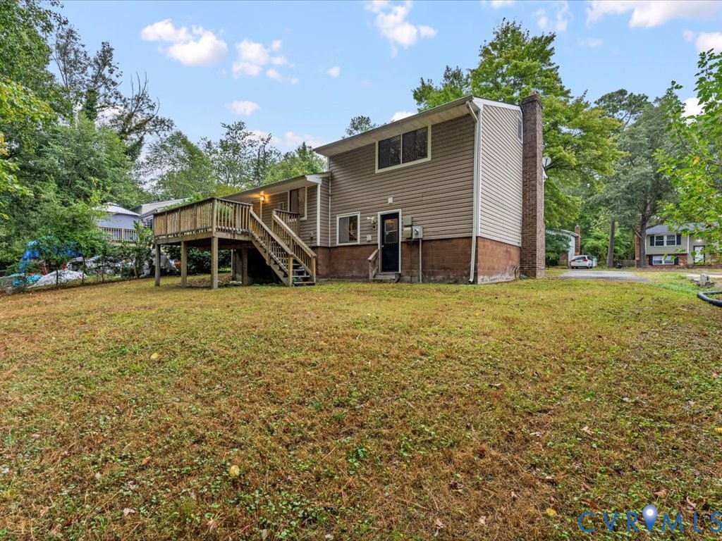 9611 Kennesaw Road Chesterfield, VA 23236 - Photo 5 of 20 Rear view of house with stairway, a chimney, a yar