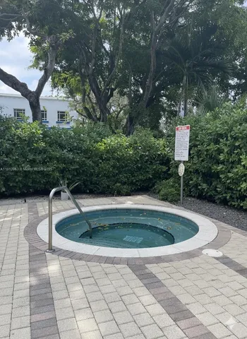 a view of outdoor space with swimming pool