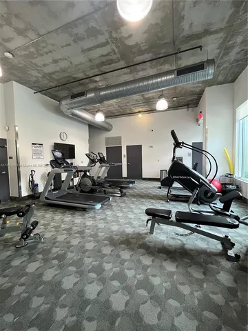 a view of a room with gym equipment