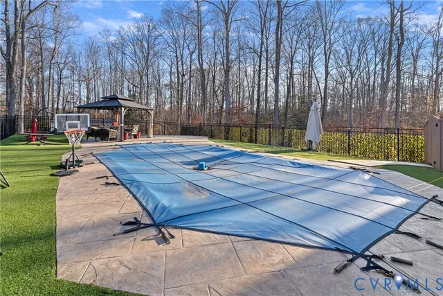 a view of a backyard of the house