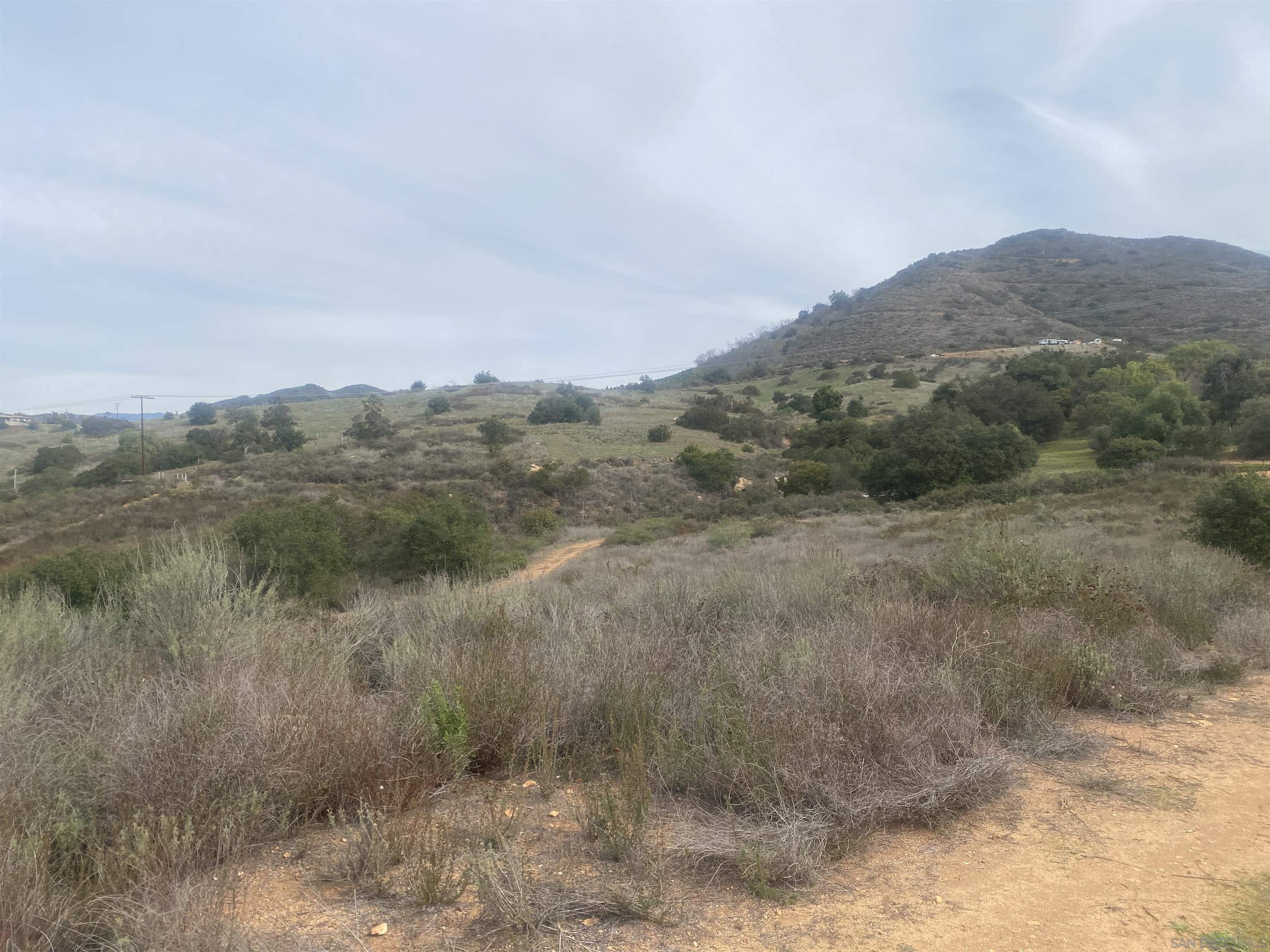 9 Lilac Road Valley Center, CA 92082 - Photo 15 of 27 a view of a lake in middle of forest