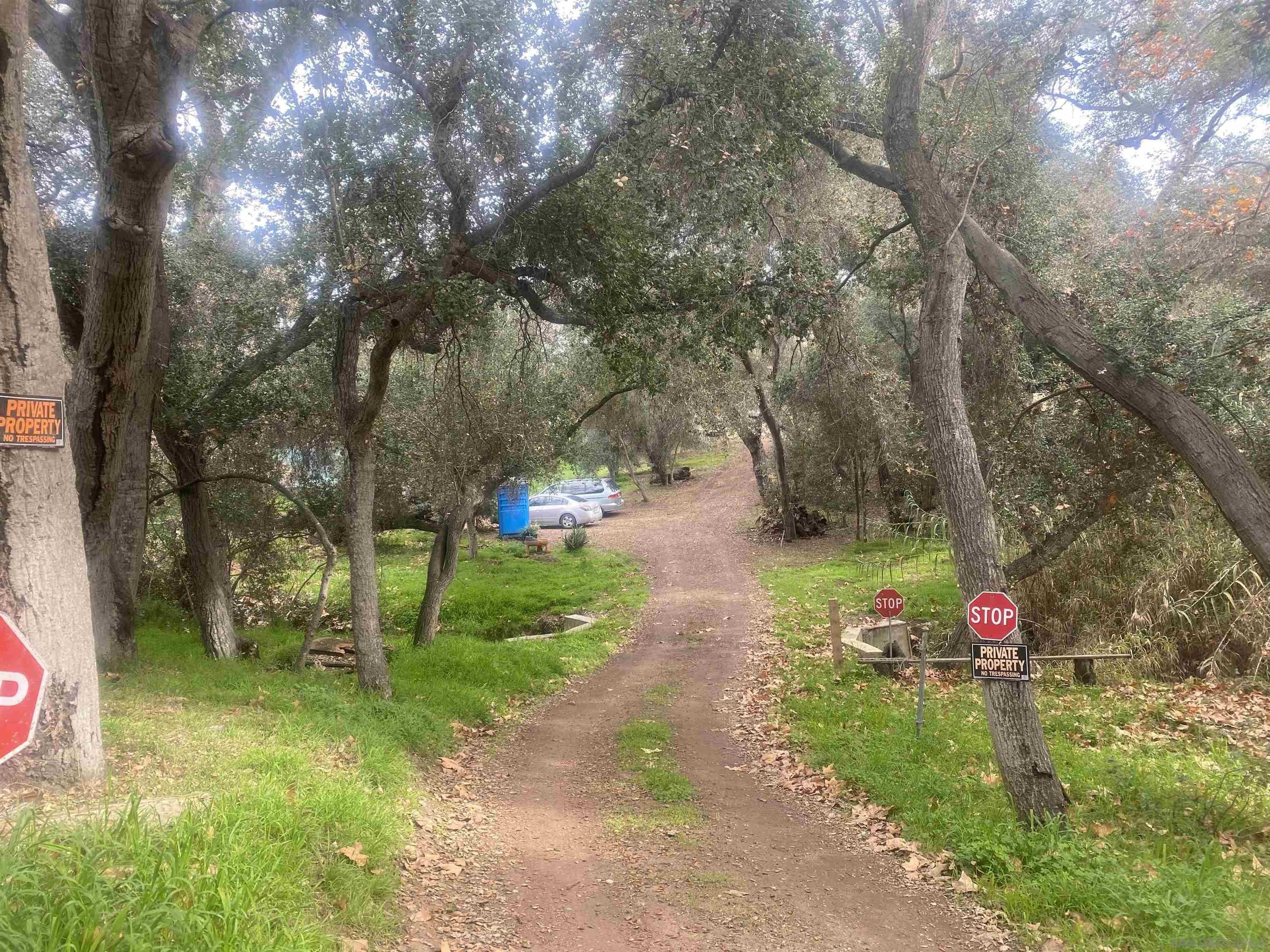 9 Lilac Road Valley Center, CA 92082 - Photo 2 of 27 a park view with large trees