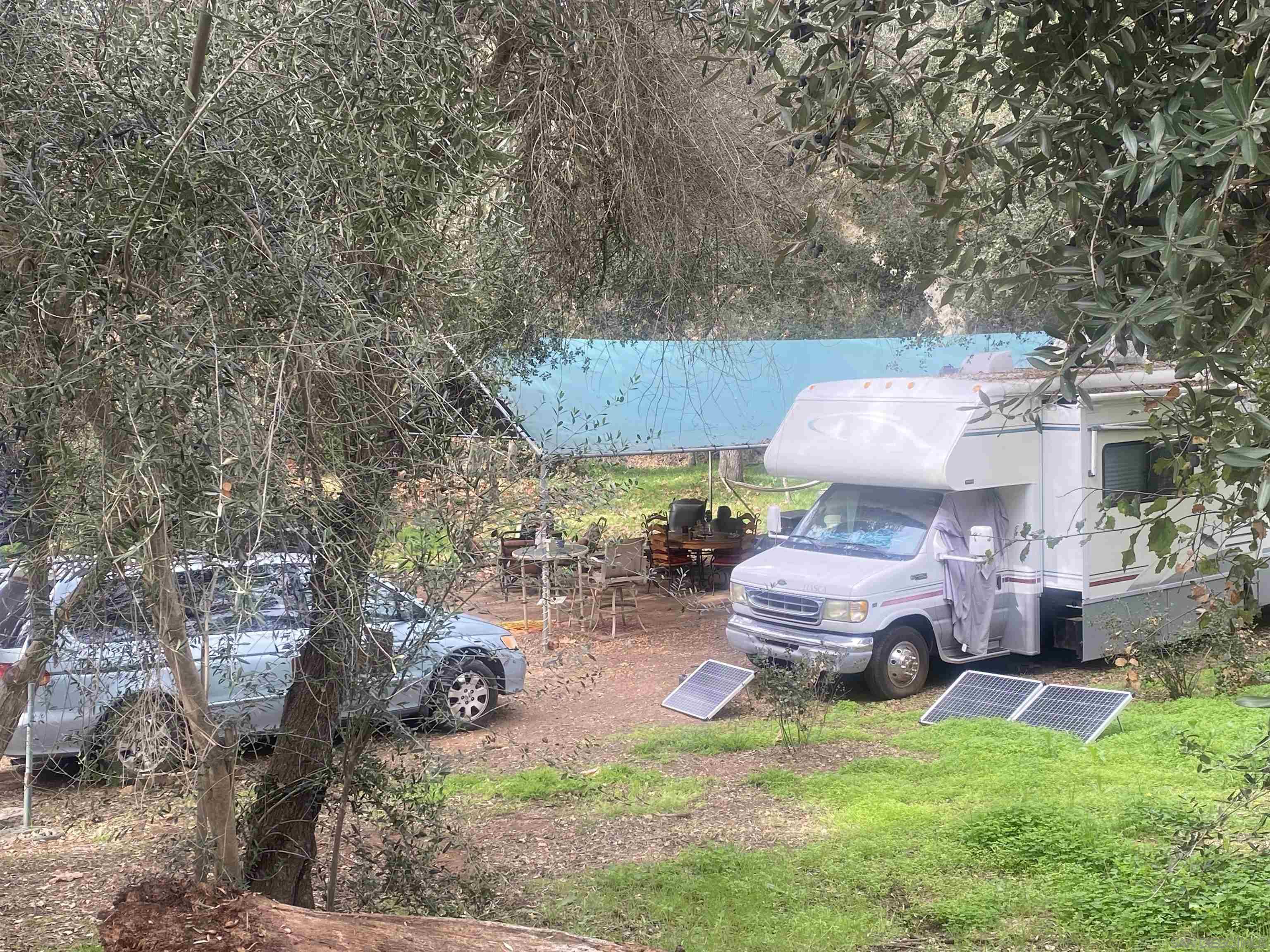 9 Lilac Road Valley Center, CA 92082 - Photo 21 of 27 a backyard of a house with table and chairs