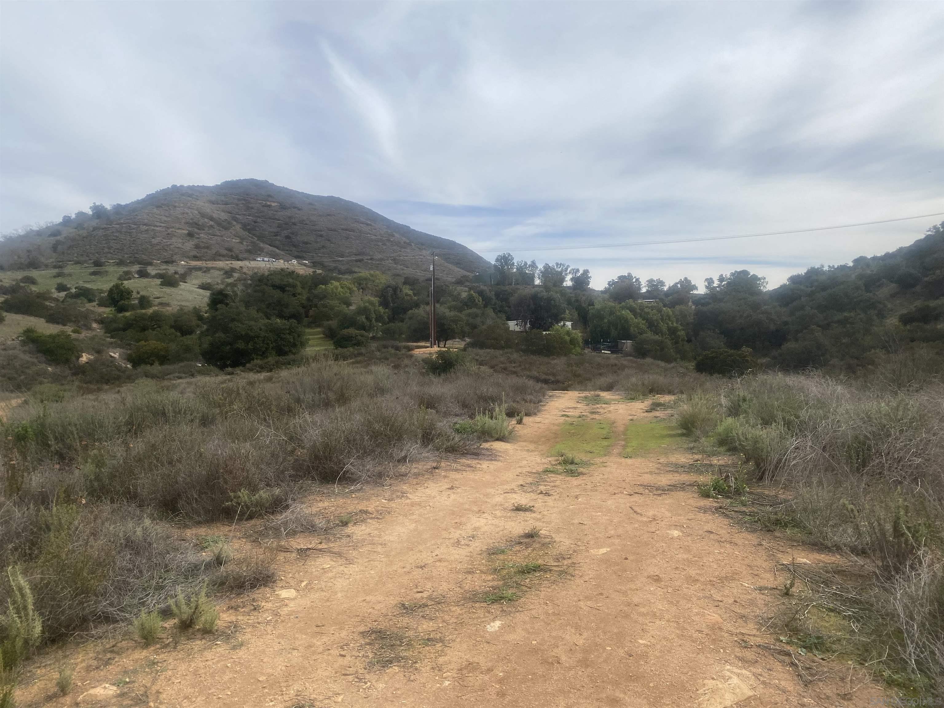 9 Lilac Road Valley Center, CA 92082 - Photo 10 of 27 a view of a lake with mountains in the background