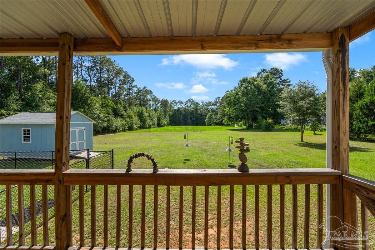 4955 Blue Ribbon Drive Milton, FL 32583 - Photo 23 of 32 a view of a porch