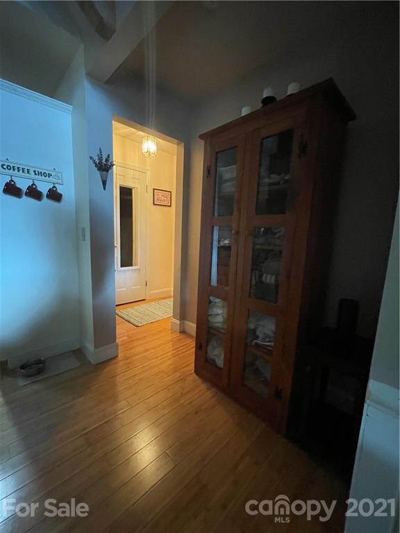 44 Emerald Mountain Road Clyde, NC 28721 - Photo 20 of 33 a view of empty room with wooden floor