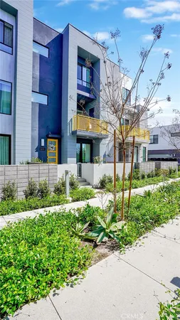 a view of a building with a yard